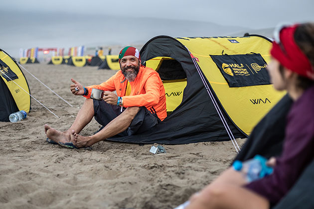 A participant of the HMDS in its tent, spaced from the other participants