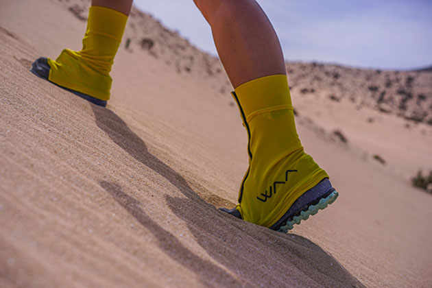 Image of gaiters to be put on the shoes, essential equipment for this kind of competition in the sand