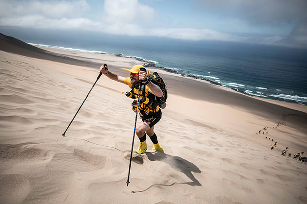 Participant walking on a dun of sand